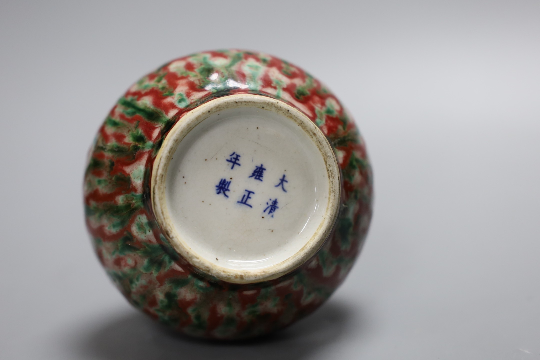 A Chinese flambé double gourd vase, 21 cms high